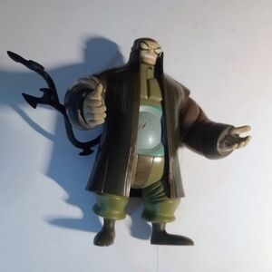 Reptile Action Figure with Brown Coat